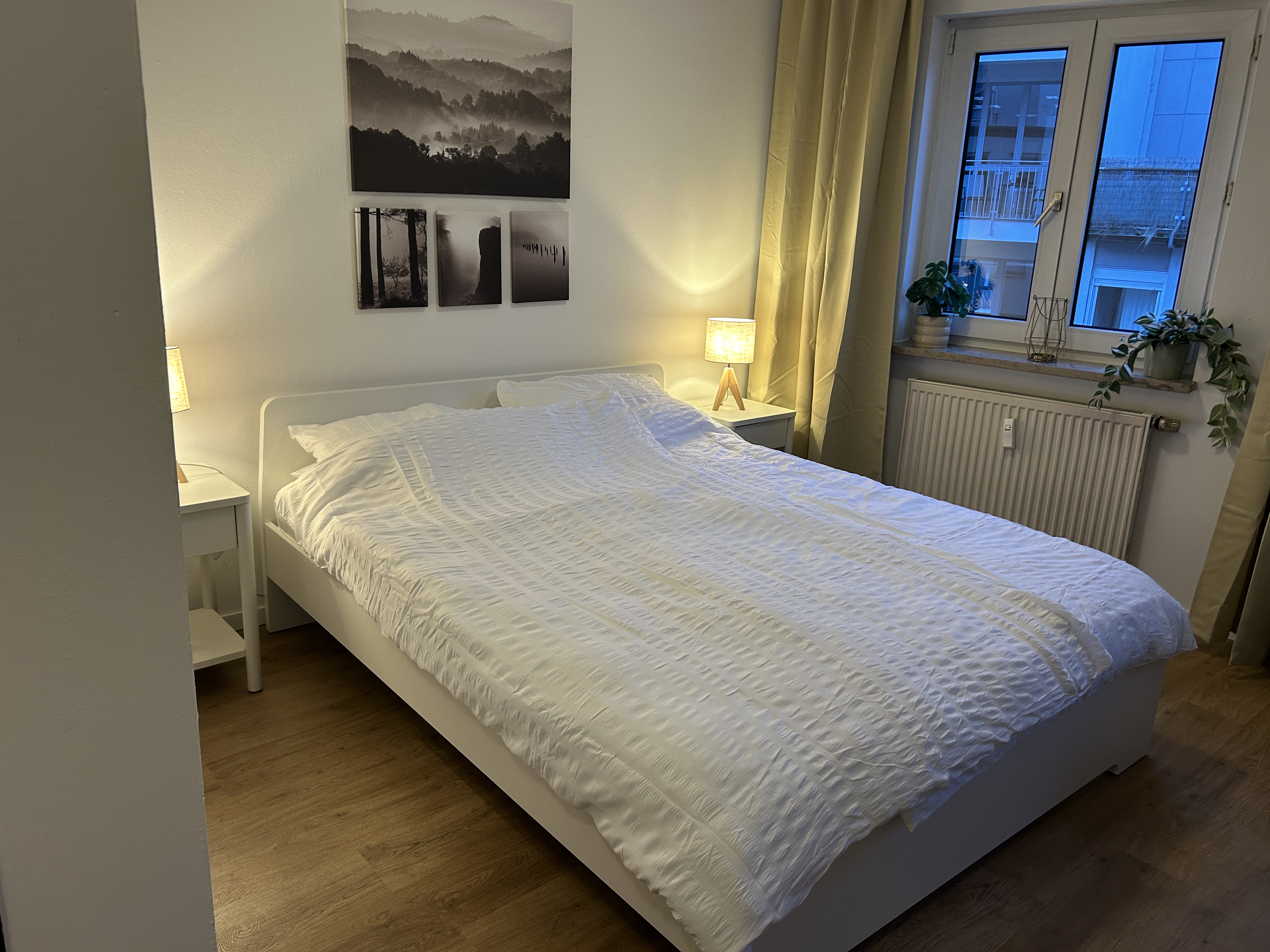 City Studio living area with sofa and television